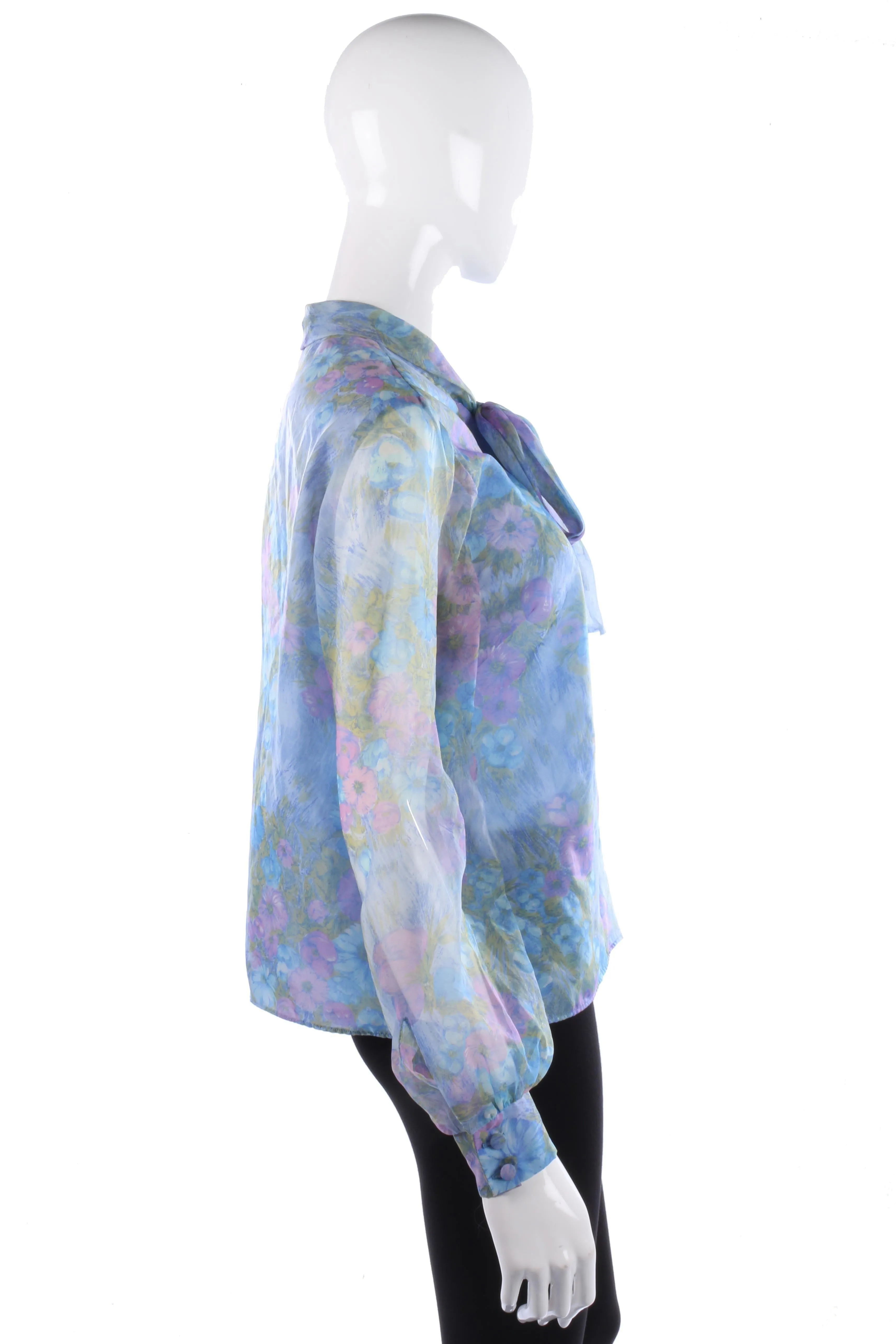 Lovely vintage blue floral blouse with a tie neck
